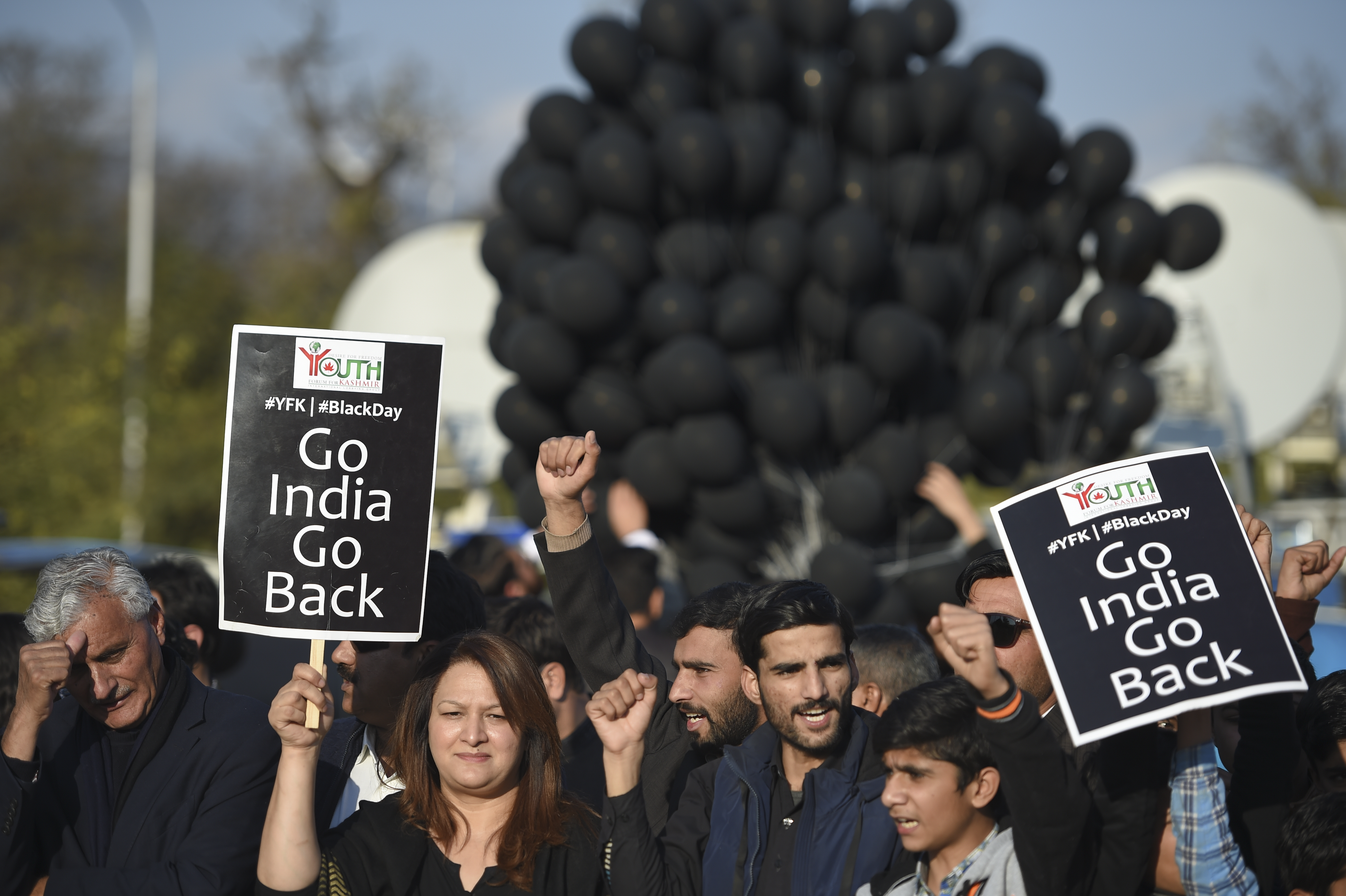 Members of Youth Forum For Kashmir take part in an anti-India demonstration in Islamabad on January 26, 2020.