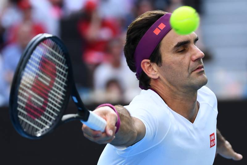 Roger Federer plays a shot