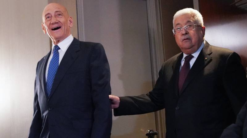Israel ex-PM Olmert defiantly rallies behind Palestinian leader