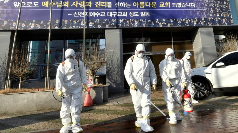 First South Korea virus patient dies as number of infections doubles