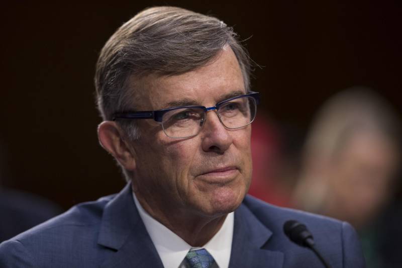 US intel chief replaced as casualties of Trump purge mount
