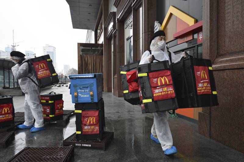 China reports only 29 more virus deaths, lowest since January