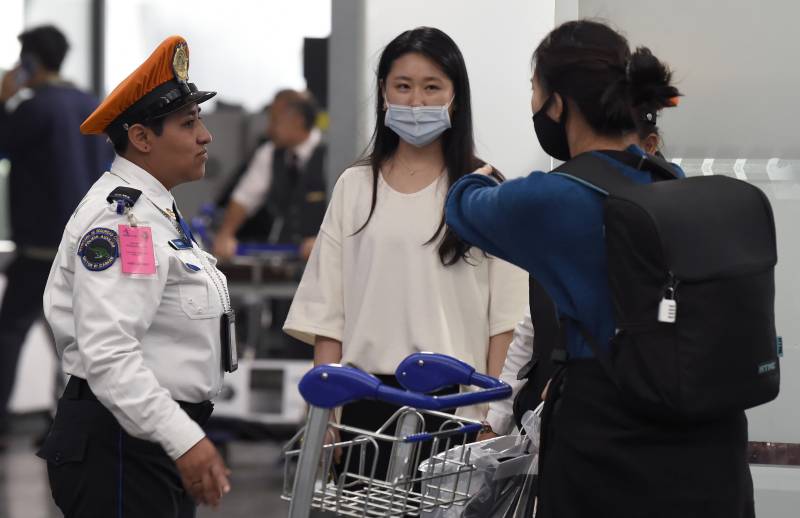 South Korea virus cases surge as WHO sounds maximum alert