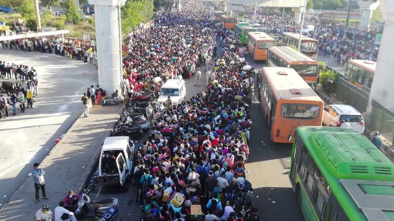 Stranded by virus lockdown, India migrant workers walk home