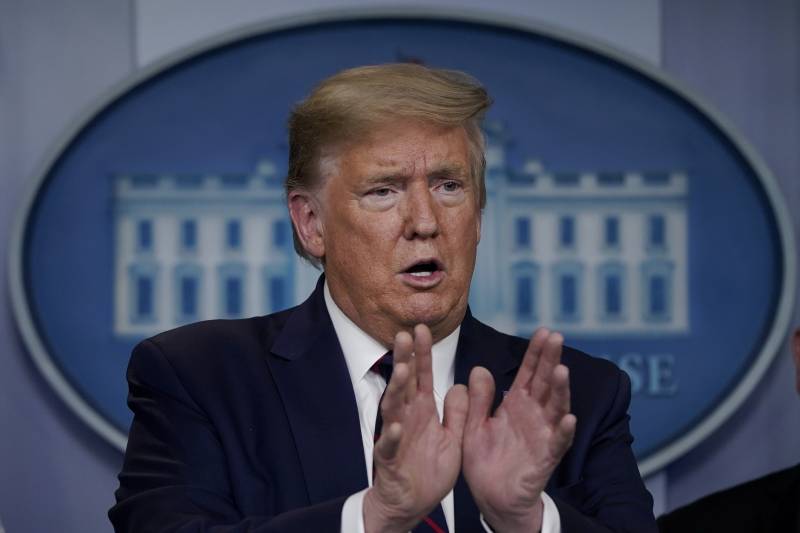 US cases cross 100,000 mark as Trump signs $2 trillion recovery plan