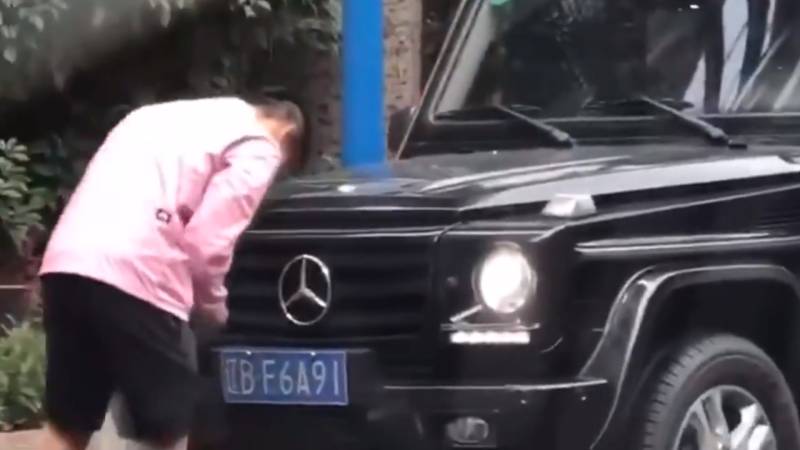 Sacked Chinese footballer sorry for altering licence plate