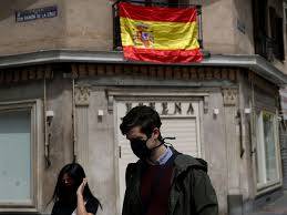 Spain revises virus death toll down by nearly 2,000