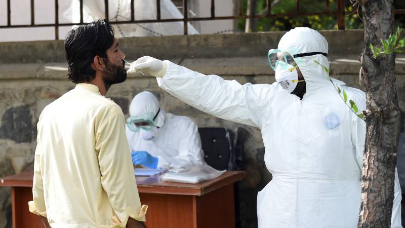 Afghanistan warns of 'disaster' as virus infections surge