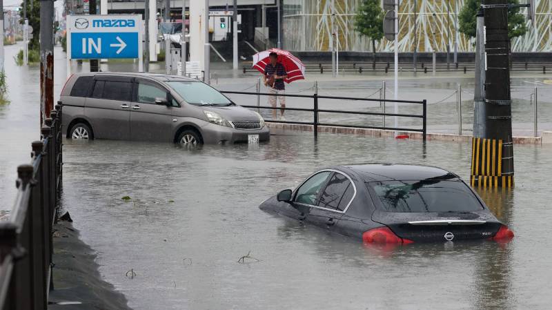 52 dead in Japan floods as more troops join rescue