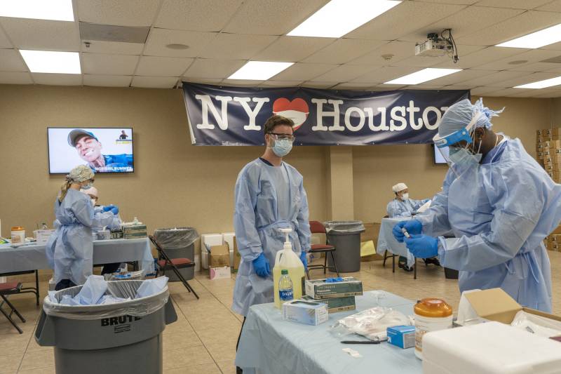 US sets another virus record with 77,638 new cases
