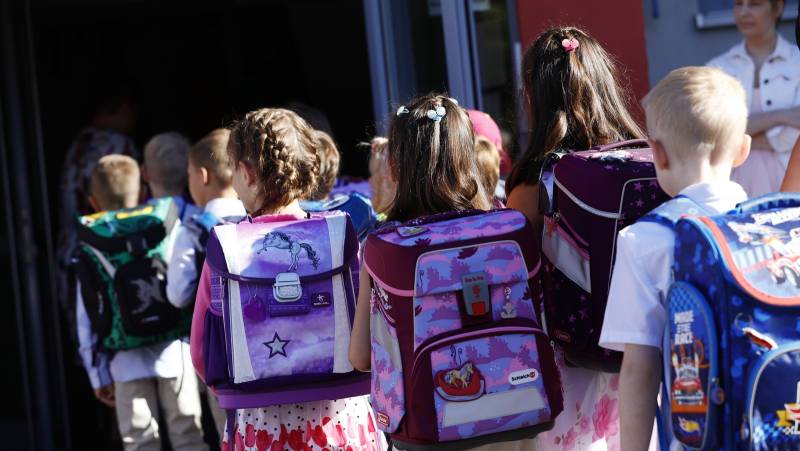 Germany closes two schools in new virus blow