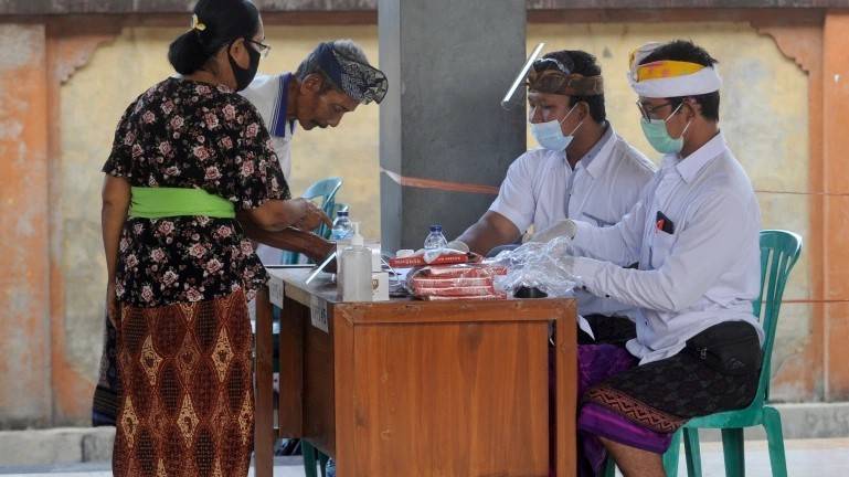 Indonesia polls go smoothly despite virus warnings