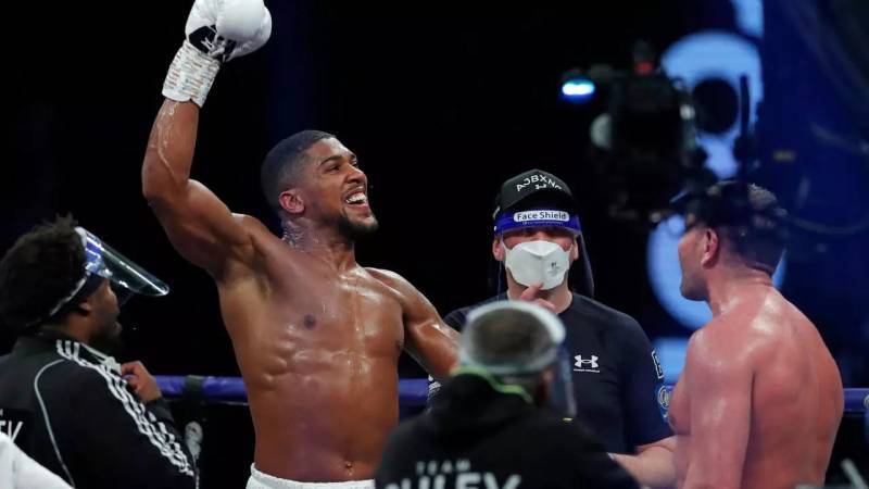 Joshua puts hand in his pocket to help gyms