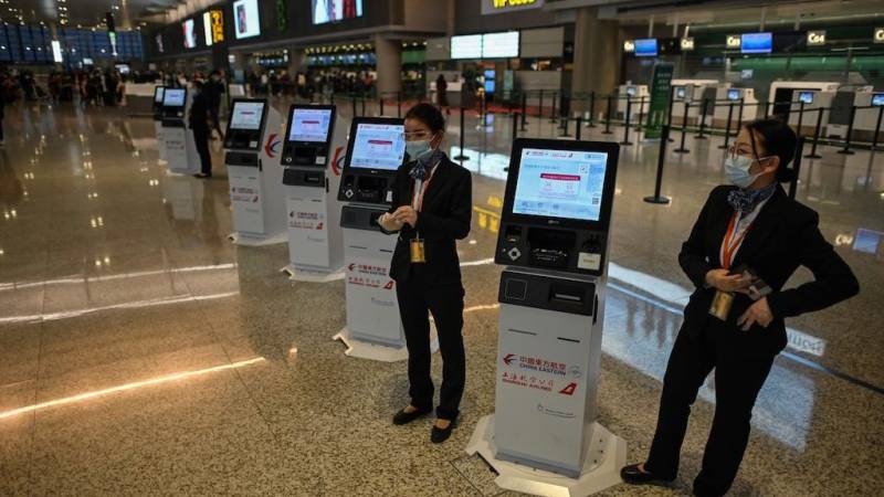 China suspends UK flights over new virus strain