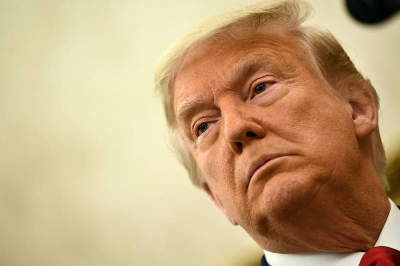 Trump warns Iran over rocket strike on embassy in Iraq