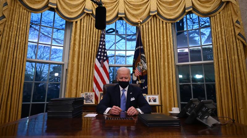 Biden unveils sweeping Covid-19 plan in first full day in office