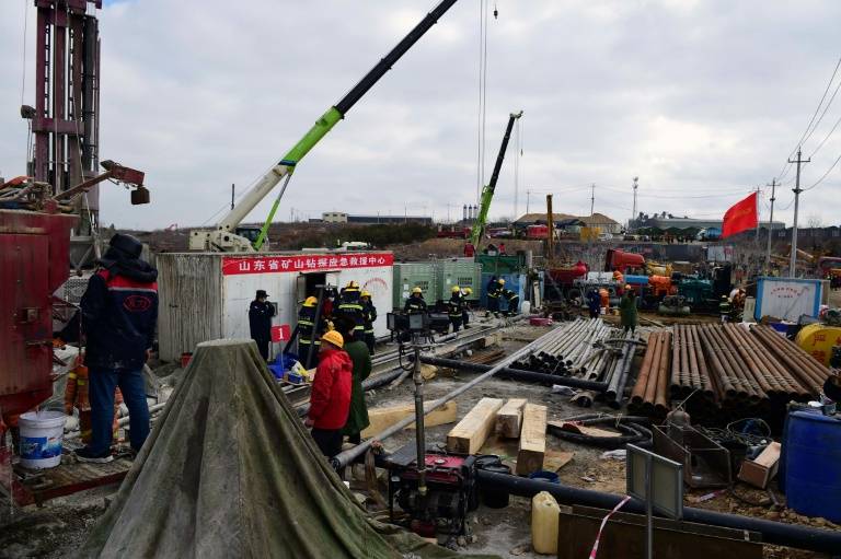 First of 22 trapped miners rescued from Chinese mine after two weeks