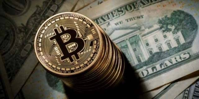 Dollar drops, as bitcoin nears $50,000