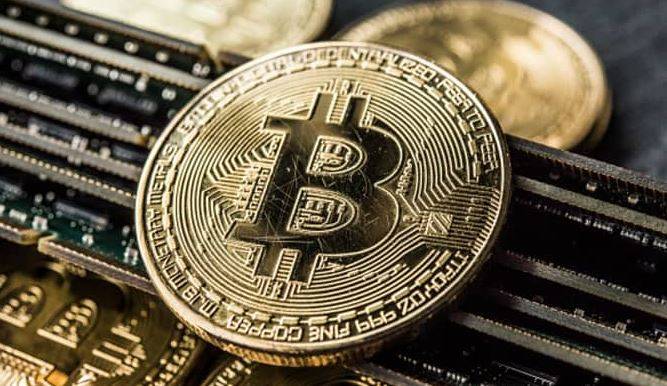 Bitcoin hits record high above $62,000