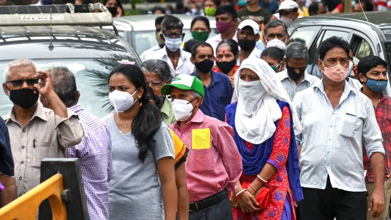India virus surge drives record global daily cases