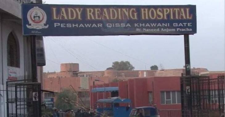 Woman gives birth outside labour room at a Peshawar hospital