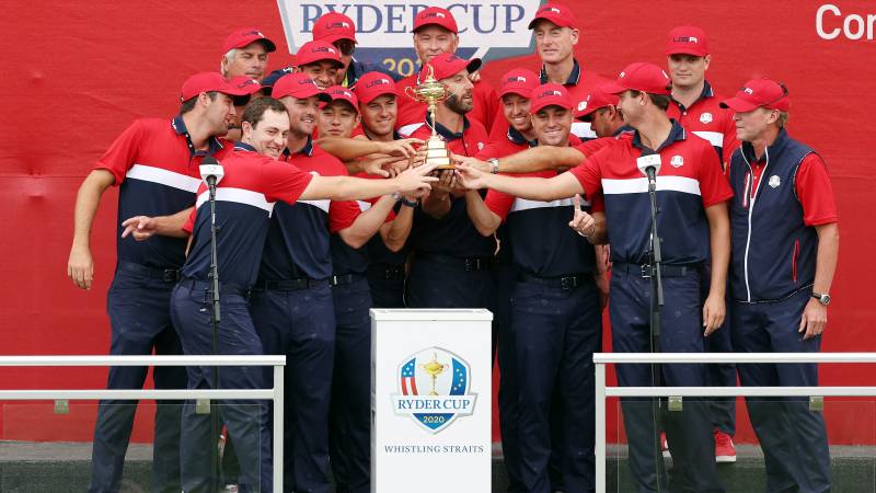Team United States celebrates with the Ryder Cup 
