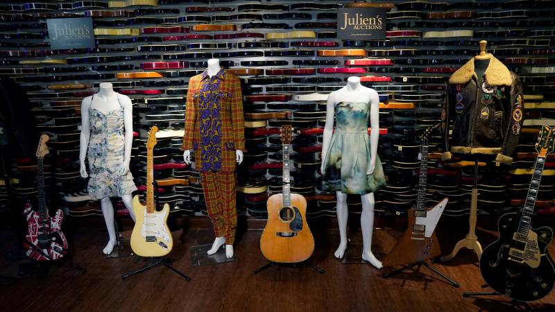 Items are seen on display during a press preview November 15, 2021 in New York to promote Julien's Auctions Icons & Idols: Rock N Roll auction that will take place November 19th and 20th. AFP