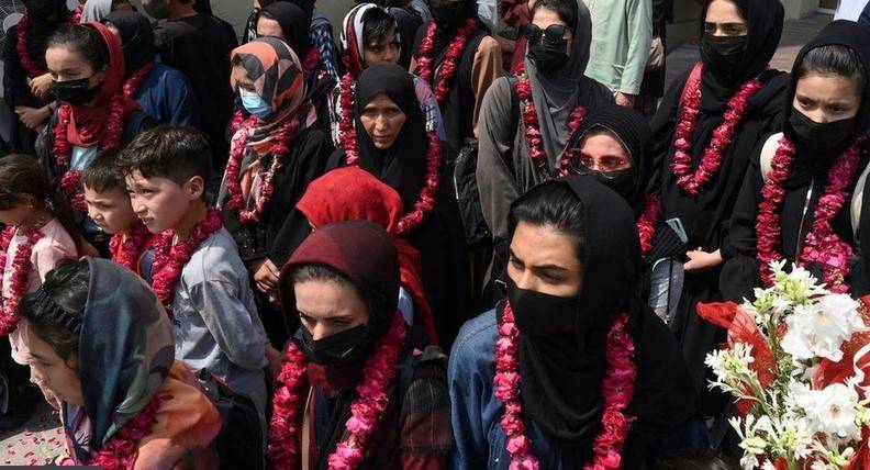 Afghan girl footballers reach UK on Kardashian-funded flight from Pakistan