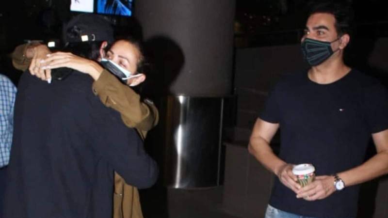 Malika Arora, Arbaaz Khan hug son as he returns home