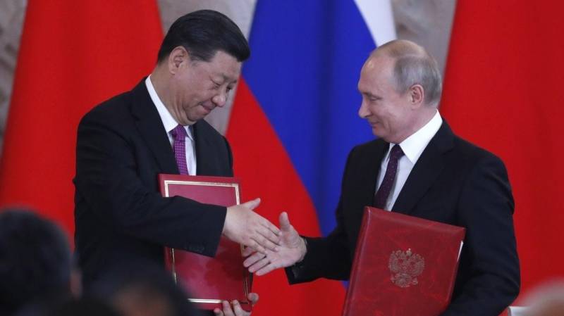 Putin hails 'model' Russia-China relations in Xi call