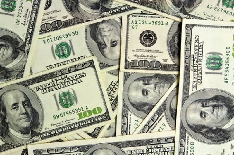 US dollar trades in positive territory against rupee