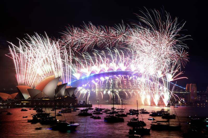 Covid-hit world welcomes 2022 with scaled-back celebrations