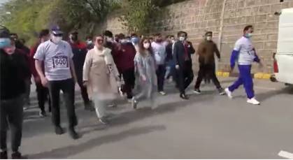 Islamabad holds first Int’l Marathon Race, President Alvi also participates