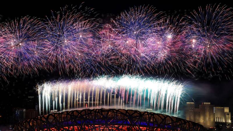 Fireworks illuminate the night sky during the closing ceremony of the Beijing 2022 Winter Olympic Games, at the National Stadium, known as the Bird's Nest, in Beijing. AFP