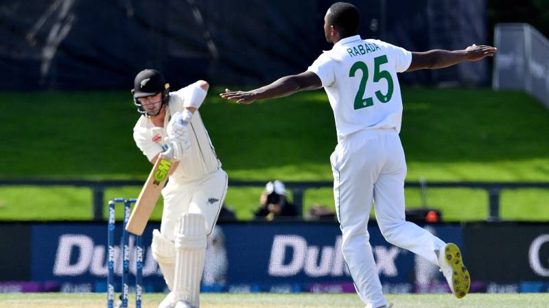 South Africa's paceman Kagiso Rabada (R) celebrates the dismissal of New Zealand's Will Young on day four of the second cricket Test match between New Zealand and South Africa at Hagley Oval in Christchurch. AFP