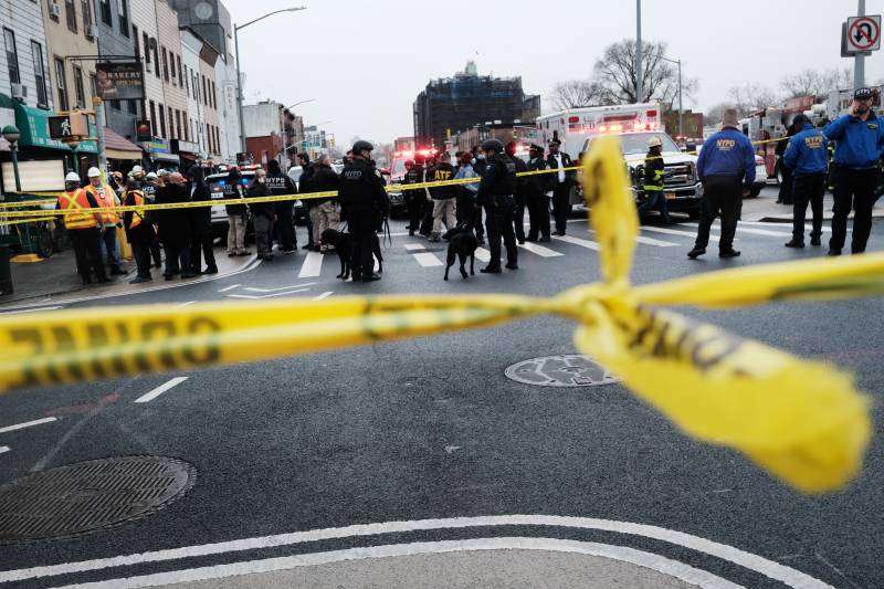 Suspect at large as Brooklyn subway shooting injures 16