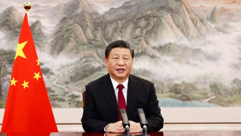 Xi says China will 'open still wider' despite tight border controls