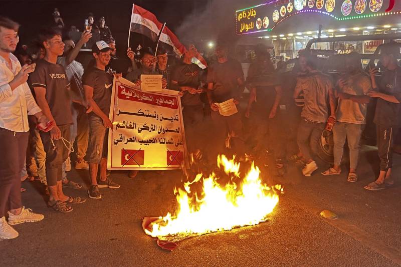 Iraqis protest against Turkey's military offensive in Iraq's autonomous Kurdistan region, in front of a Turkish visa centre in the central Iraqi city of Karbala. AFP