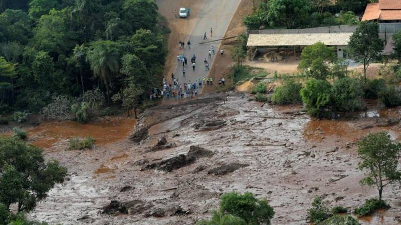 Homes 'swept away' after South Africa mine dam burst