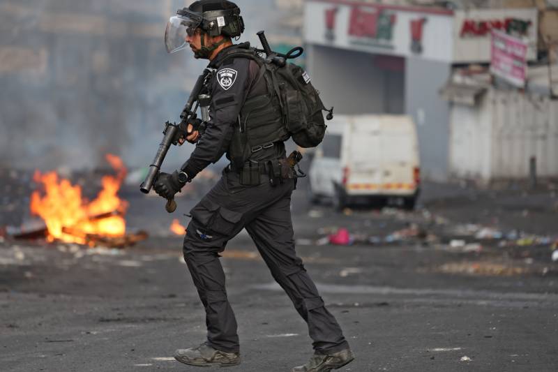 A member of the Israeli security forces is pictured in the Shuafat refugee camp in Israeli-annexed east Jerusalem, during confrontations with Palestinian protesters. AFP