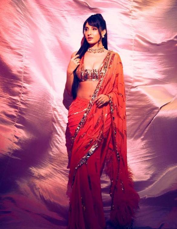 Nora Fatehi raises temperature again with her hot dance at beach