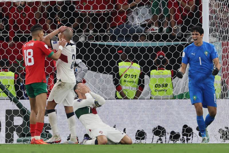 Portugal's defender Pepe (2ndL) and Portugal's forward Cristiano Ronaldo react to a missed opportunity during the Qatar 2022 World Cup quarter-final. AFP