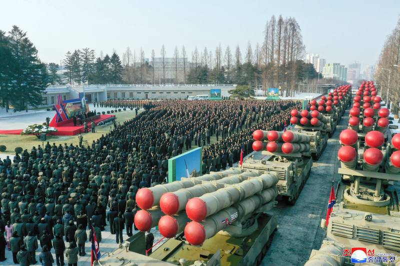 This picture taken on December 31, 2022 and released from North Korea's official Korean Central News Agency (KCNA) on January 1, 2023 shows a ceremony of donating 600mm Super-large Multiple Launch Rocket System in the yard of the headquarters of the Central Committee of the Workers' Party of Korea in Pyongyang. AFP 