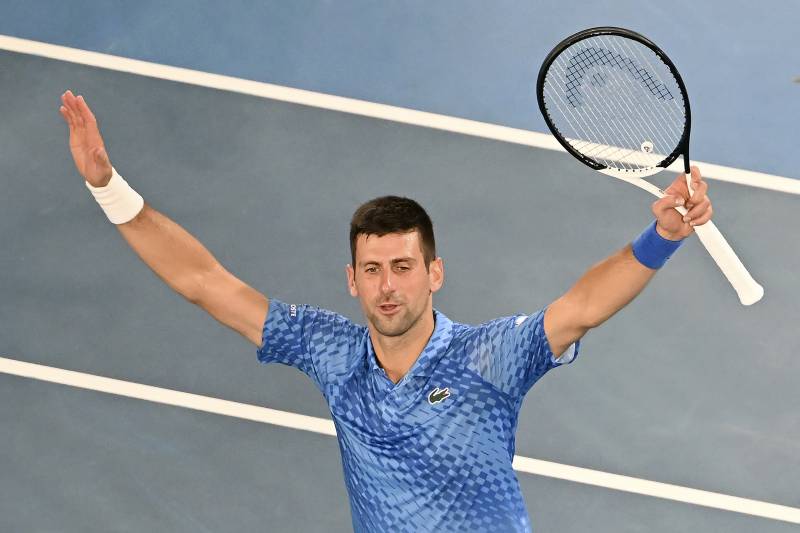 Serbia's Novak Djokovic celebrates a match point against Tommy Paul of the US after the men's singles semi-final match on day twelve of the Australian Open tennis tournament in Melbourne. AFP