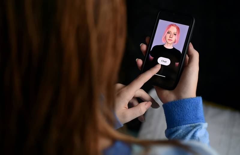In this photo illustration a virtual friend is seen on the screen of an iPhone on April 30, 2020, in Arlington, Virginia. Users of the Replika 