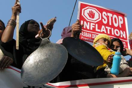 Protesters lay down on railway tracks against high inflation