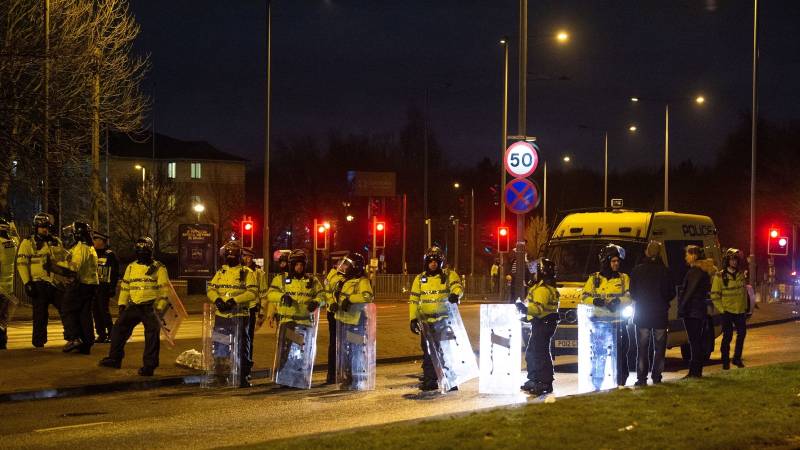 UK police charge teen over violence outside migrant hotel