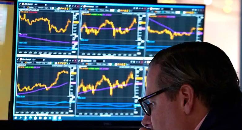Stocks mostly fall but Paris hits record high
