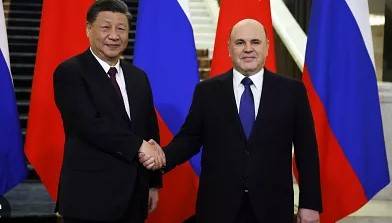 President Xi Jinping meets with Russian Prime Minister Mikhail Mishustin