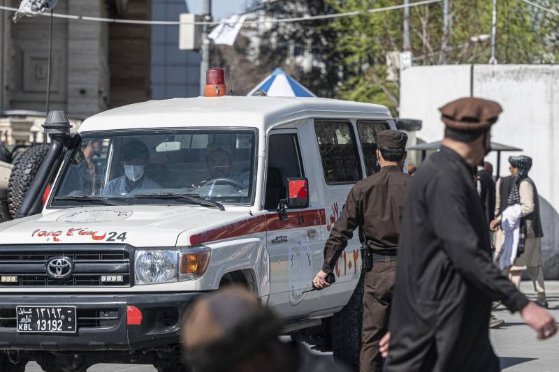 An ambulance carries victims from near the site of a suicide attack in Kabul. AFP